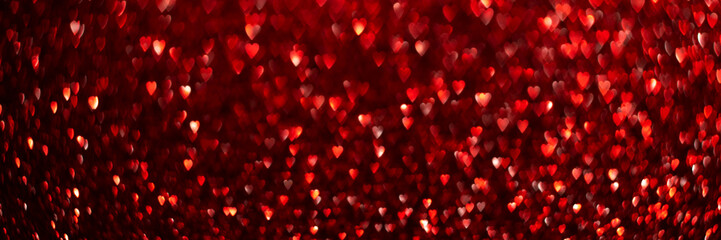 Wall Mural - Red hearts, sparkling glitter bokeh background banner, valentines day abstract defocused texture header