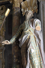 Wall Mural - Saint John the Evangelist, statue on the high altar in the Parish Church of Saint Michael the Archangel in Ludina Croatia