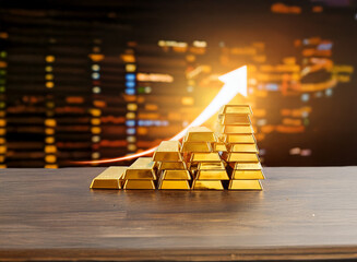 Leinwandbilder - Golden bars arranged as an upward trend graph against a blurred city lights background, symbolizing financial growth and success.