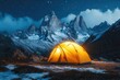 © julija - majestic mountain camping scene with illuminated tent under starry night sky and snow-capped peaks in wilderness landscape
