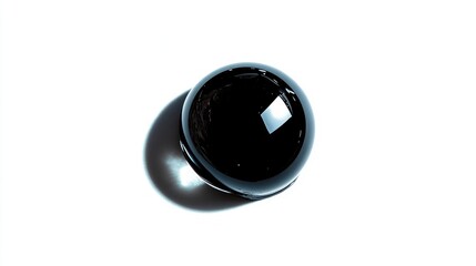 Poster - Macro shot of a solitary black oil droplet exhibiting reflections on a clean white background showcasing texture and color contrast