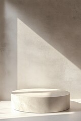 Minimalist circular pedestal showcasing natural light and soft shadows in a serene interior