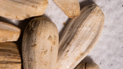Poster - A bunch of sunflower seeds are shown in a close up