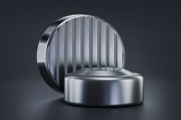 Aufkleber - Sleek metallic cylindrical objects, one with vertical grooves, create a modern, minimalist display.