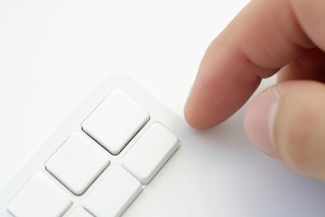 Poster - A person's finger typing on a white keyboard