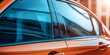 © Levan - Side view of car window tint showcasing ceramic film that offers superior heat rejection and UV protection. This car tinting service ensures a stable color on the installed glass surface.