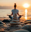 © SSTC AI Photo&Video - Serene Sunset Yoga: A woman sits in a peaceful yoga pose on a beach at sunset, a carefully balanced stack of stones in the foreground, symbolizing balance and tranquility.