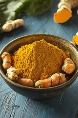 Sticker - Bowl of turmeric powder and ginger slices. The bowl is on a wooden table. The spices are arranged in a way that they look like they are ready to be used in a recipe