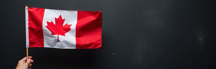 Aufkleber - A Person Is Holding A Canadian Flag Against A Black Textured Background With Plenty Of Space To Add Text Over Them. 00003