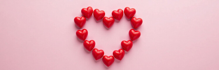Poster - A Heart Shape Made Of Red Hearts Is Positioned In The Center Of A Pink Background Leaving Space To Add Text. 00001