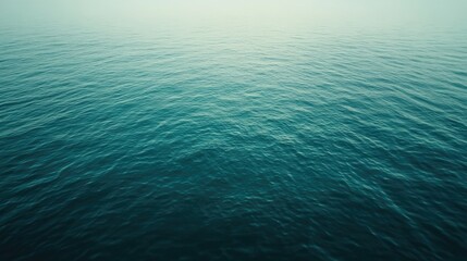 Poster - aerial view of serene turquoise ocean waves creating a minimalist abstract nature background for tra