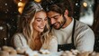 © JOKO STUDIO - Couple baking Christmas cookies together in a snowy cabin kitchen.