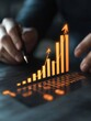 © Ivan - Hands are positioned over a dark surface while analyzing an upward trending digital chart. The increasing bars and arrows indicate growth potential in a business context