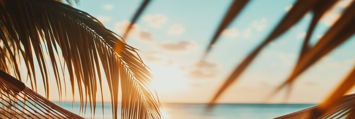 Poster - Golden sunset illuminates palm trees framing a hammock, creating a serene and inviting scene of tranquility at a tropical beach resort, promising ultimate relaxation and escape
