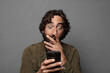 © kues1 - young bearded man using a smartphone