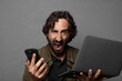 © kues1 - young bearded man using a laptop