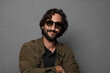 © kues1 - young bearded man wearing sun glasses