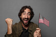 © kues1 - young bearded man with an usa flag