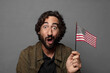 © kues1 - young bearded man with an usa flag