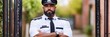 © Brian - security guard standing outside of gate