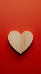 Poster - Light wooden heart resting on vibrant red background, symbolizing love and affection, ideal for valentine's day, mother's day, or any celebration of romance