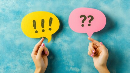 Poster - Two hands holding yellow and pink speech bubbles against a textured blue background, symbolizing communication, questions, answers, and decision making
