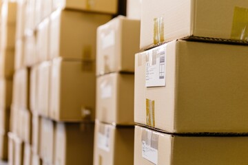 Poster - A collection of boxes piled high, suitable for background or storage use