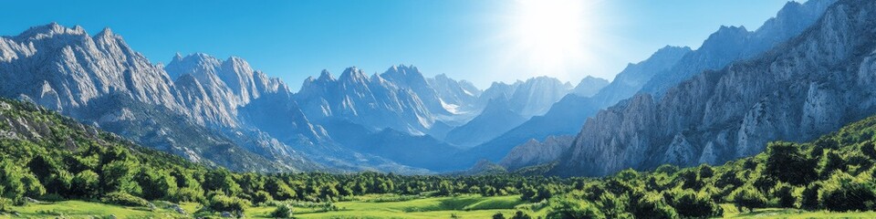 Poster - Stunning Panoramic View of Majestic Mountain Range and Serene Green Valley Under Clear Blue Sky and Radiant Sunlight Perfect for Nature and Landscape Lovers