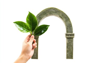 Aufkleber - A person holds a green leaf in front of an arch, symbolizing nature and architecture