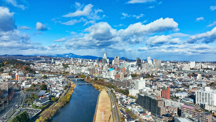 Wall Mural - city, urban, town, view, scenery, drone, aerial view, buildings, japan, blue sky, society, construction, rise, environment, traffic, road, building, architecture, development, growth, copy space, hori