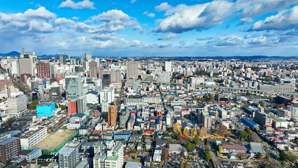 Fototapete - city, urban area, landscape, scenery, urban, town, society, aerial view, drone, buildings, economy, business, government, blue sky, copy space, daytime, sunny, bright, public, local, municipality, reg