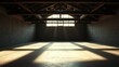 © kavalin - Sunlight streams through a high window in an empty, unfinished room with wooden beams and a concrete floor.