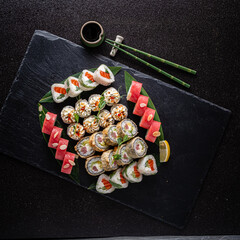 Wall Mural - sushi on the black background