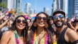 © AH TAR STOCK - Three people are smiling and wearing sunglasses and rainbow clothing