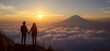 © Vergiliy - Couple Holding Hands at Sunset Over Clouds with Volcano in Background, Breathtaking View of Nature's Beauty, copy space for text