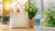 © Sansern - Stylish tote bag displayed with indoor plant modern office setting