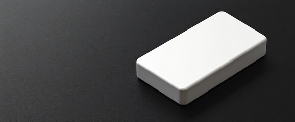 Poster - White rectangular block on black background.