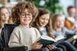 © Anastasiya - A smiling child with curly hair and glasses holding an open book, sitting in a classroom surrounded by other children, creating a joyful and inclusive learning environment