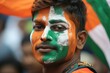 © nsit0108 - Young indian cricket fan showing national colors on his face