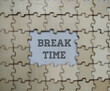 © Amir - Break Time Symbol. Break Time concept words on wooden blocks and Break Time