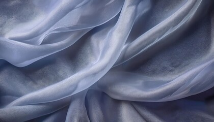 soft folds of light blue sheer fabric with delicate texture for artistic backgrounds, product photography, or graphic design projects

