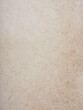 © Food Images - A neutral beige surface displays soft variations in tone and texture, ideal for backgrounds in design projects or as a modern tabletop. Its simplicity enhances versatility in creative endeavors
