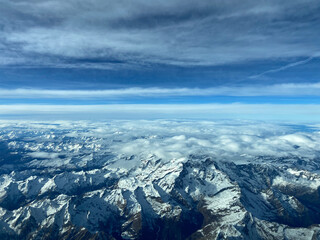 Aerial view of snowcapped mountains.