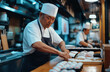 © pisan thailand - Sushi preparation action by chef in japanese restaurant culinary art indoor close-up view craftsmanship focus