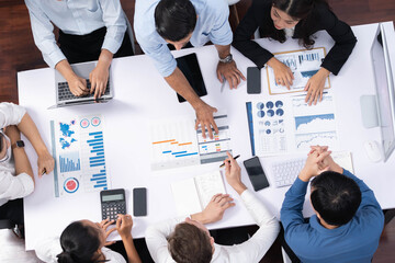 Leinwandbilder - Top view project manager communicate and collaborate with team using project management software, tracking progress of project task and making schedule plan at meeting table. Prudent