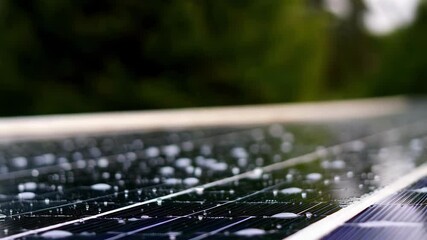 Aufkleber - Numerous glistening dew drops rest on the dark, textured surface of a solar panel, reflecting the surrounding environment and adding a touch of natural beauty to the technological landscape