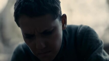 Poster - Concentrated young builder with furrowed brow demonstrates the hard work and dedication involved in construction, highlighting the effort and precision required in manual labor