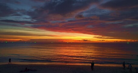 Wall Mural - aerial view of colorful sky in sunset above the sea at Karon beach Phuket.
smooth cloudy sky at sunset at Karon beach Phuket. Gradient color. Sky texture, abstract nature background.

