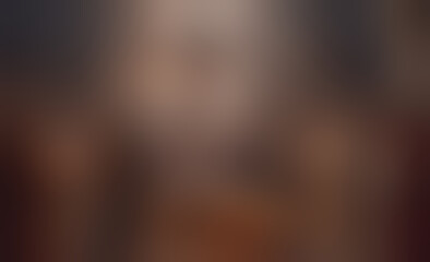 Poster - Blurry image of a person. The person is wearing a black shirt. The shirt is not visible