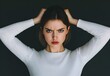 © nonni - Portrait of an Upset Woman Expressing Frustration with Hands on Head Against a Dark Background, Capturing Emotional Intensity and Human Experience